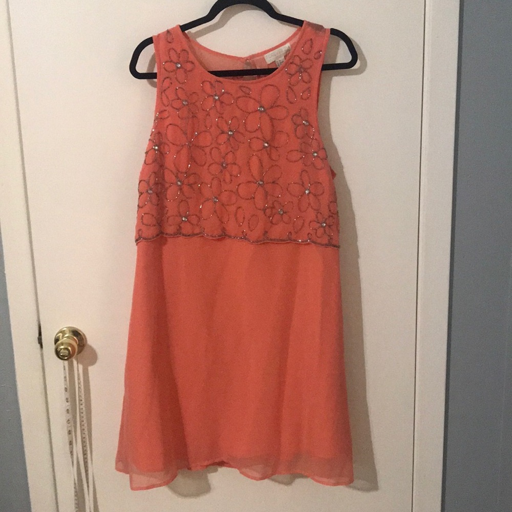 Beautiful beaded dress with a super fun back